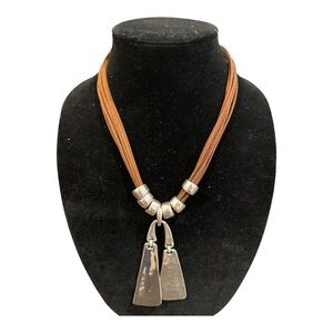 Robert Lee Morris necklace - leather with silver tone pendant